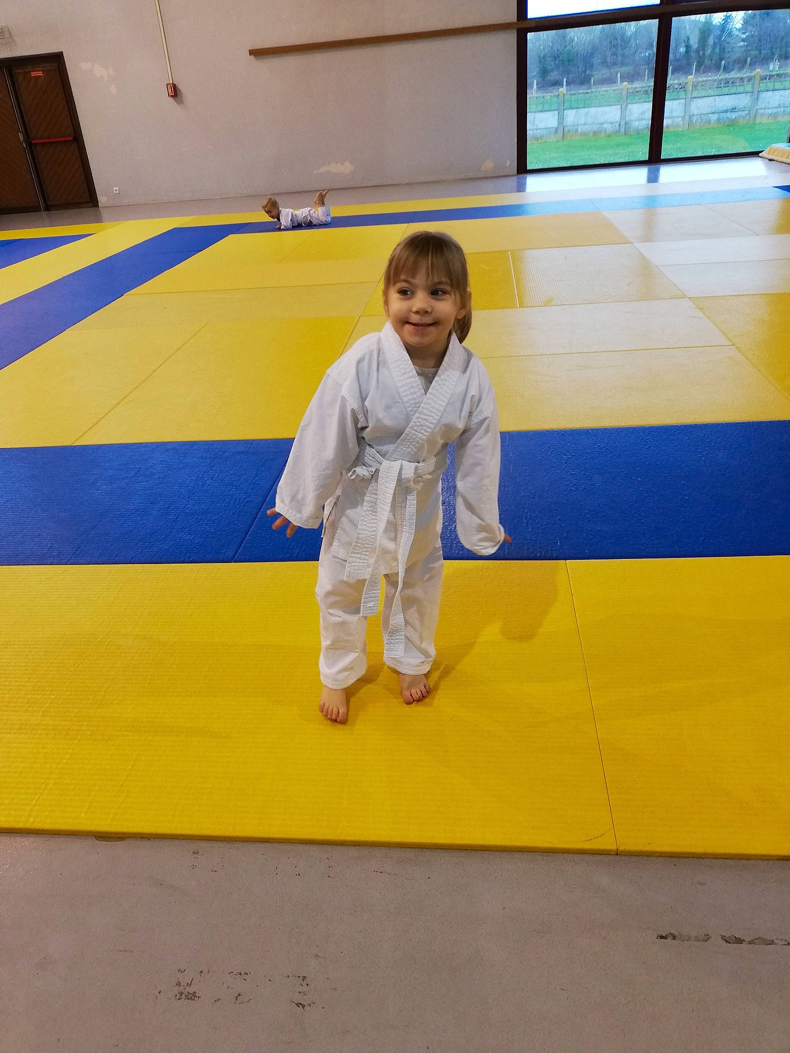 Samaëlle a rejoint le concours — aidez-le/la à gagner de superbes lots ! arm, blue, brazilian_jiu_jitsu, child, combat_sport, competition_event, contact_sport, dobok, fun, individual_sports, japanese_martial_arts, joy, judo, jujutsu, karate, martial_arts, martial_arts_uniform, mat, person, sports