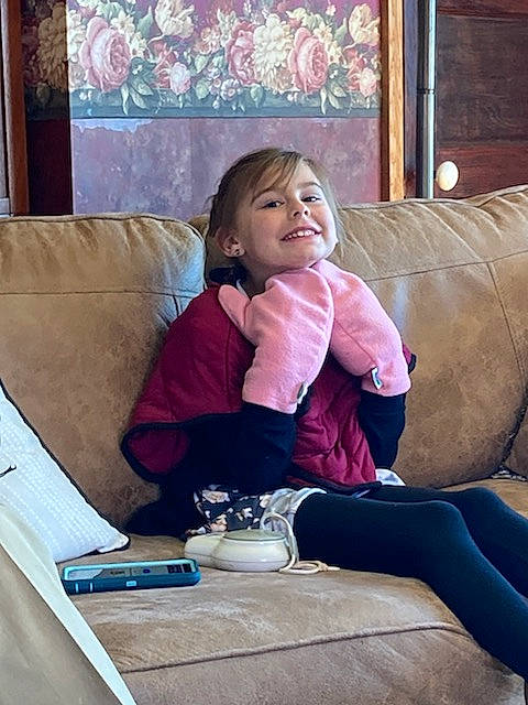 Barbara joined the competition — help win amazing prizes! comfort, couch, finger, flooring, happy, human_body, human_leg, interior_design, joy, knee, lap, leisure, living_room, person, picture_frame, pink, purple, sitting, smile, textile