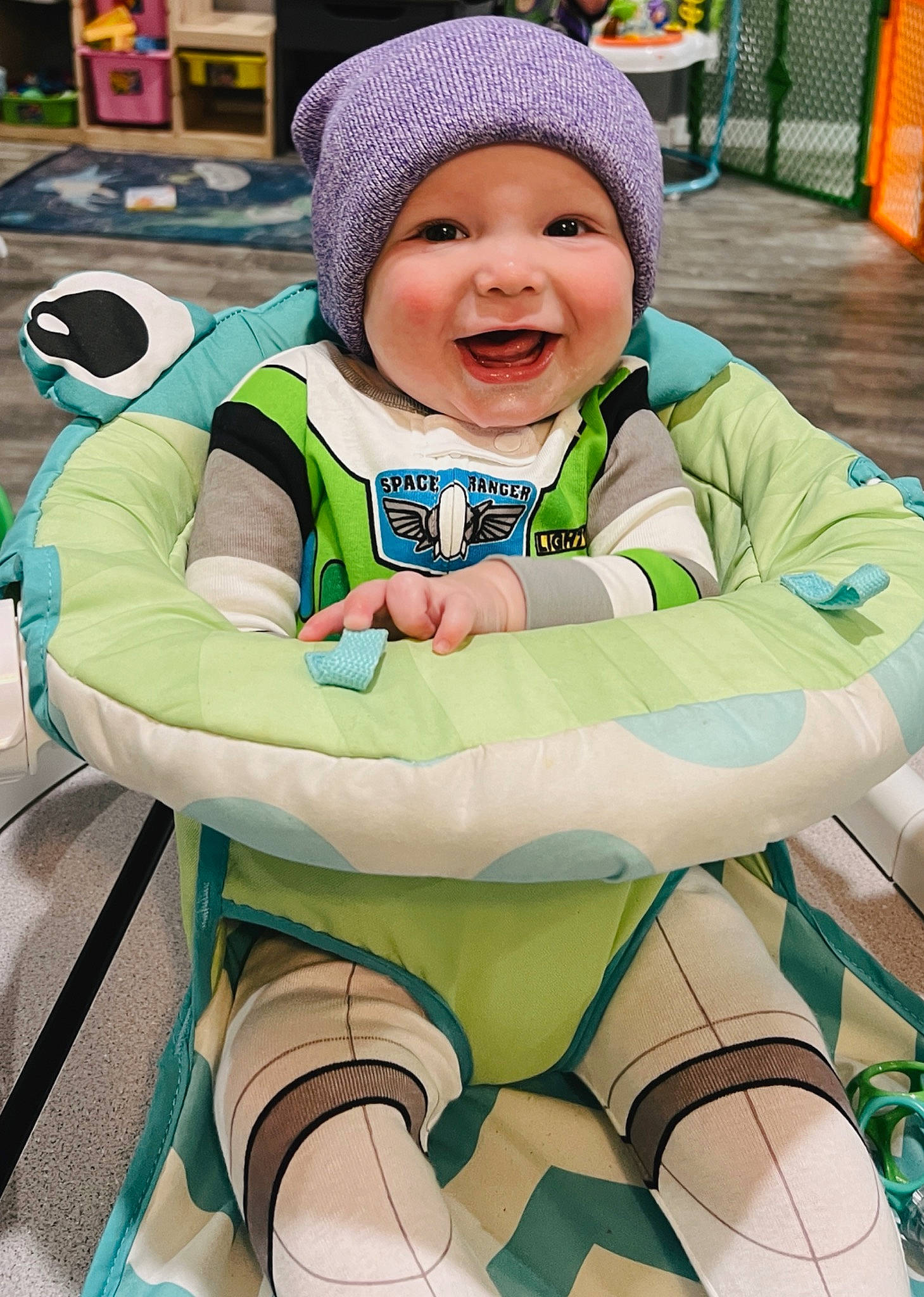 Oakland joined the competition — help win amazing prizes! baby, baby_toddler_clothing, cap, chair, child, comfort, event, fun, green, happy, hat, headwear, leisure, person, personal_protective_equipment, photograph, skin, smile, thigh, toddler