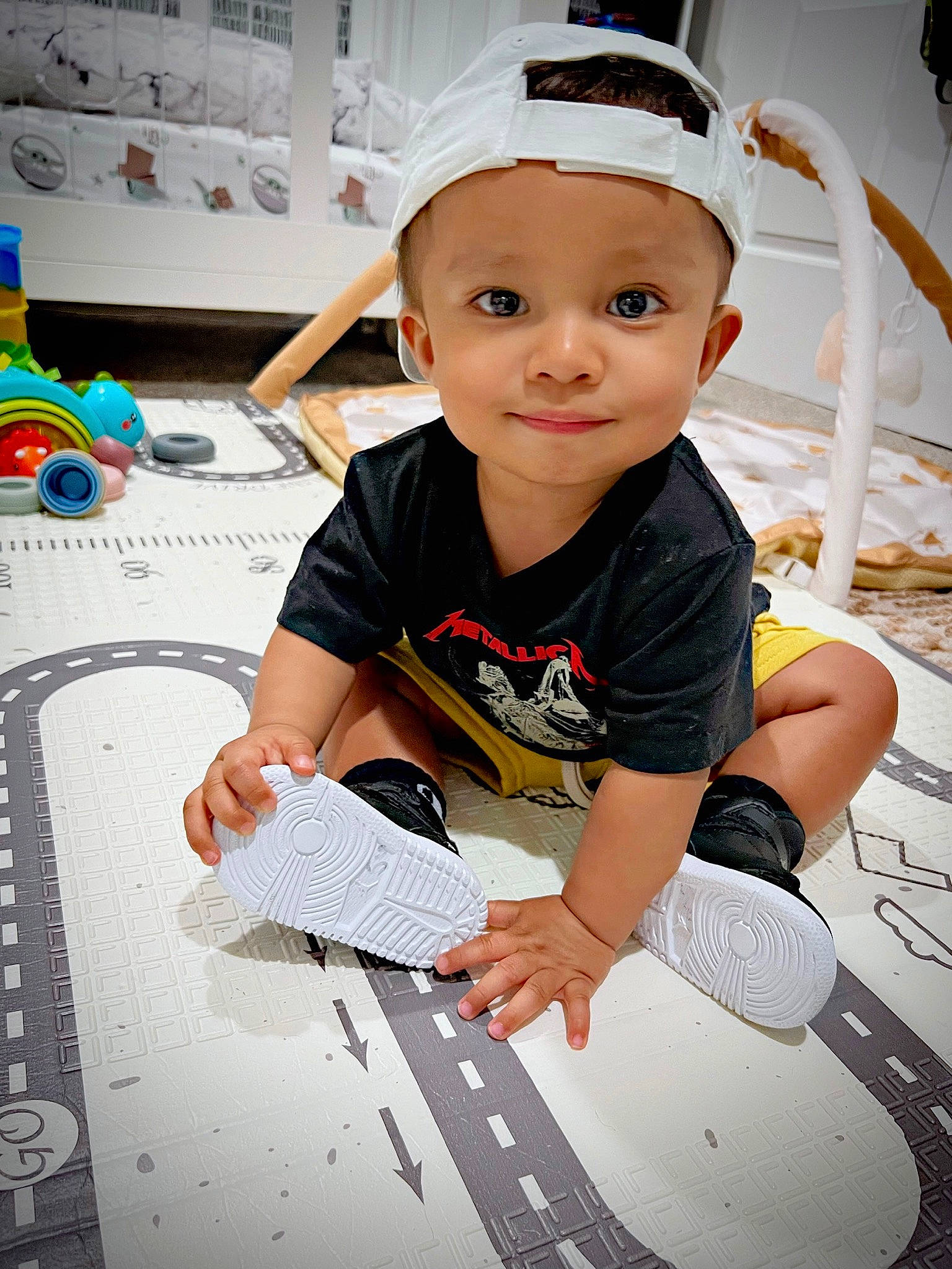 Keanu joined the competition — help win amazing prizes! baby, cap, child, computer_keyboard, elbow, flash_photography, flooring, fun, happy, headwear, human_leg, knee, leisure, nail, office_equipment, pattern, person, play, room, sitting