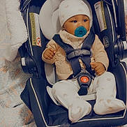 Corday joined the competition — help win amazing prizes! baby, car_seat, pacifier, hat, onesie, infant, child, blanket, sitting, indoor, cute, safe, straps, clothing, face, headwear, comfort, soft, young, adorable