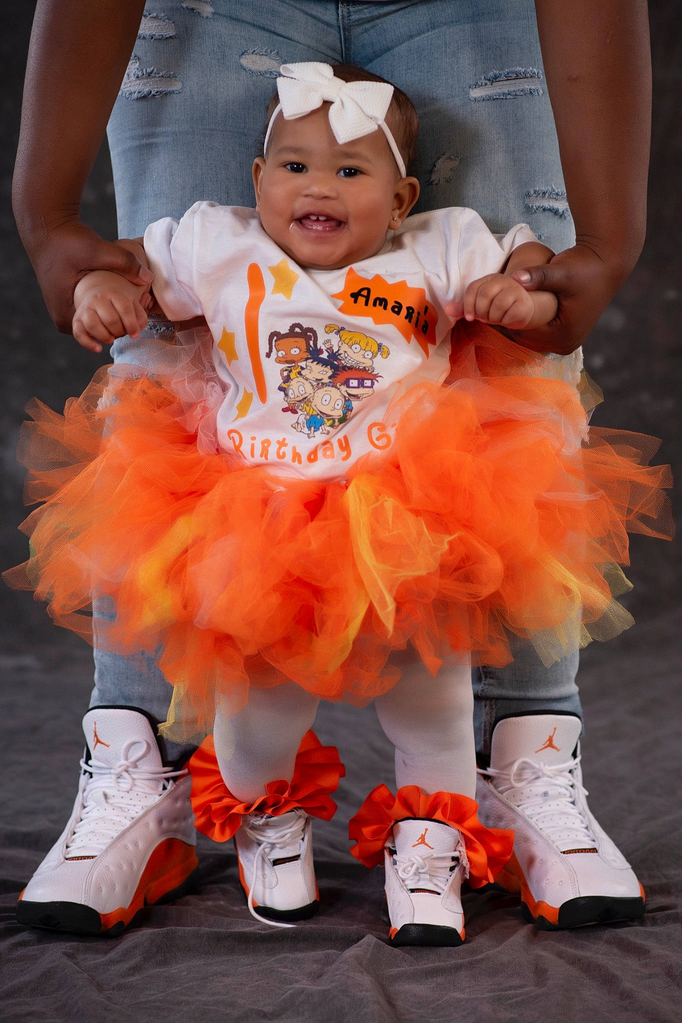 Amari'A joined the competition — help win amazing prizes! baby, baby_toddler_clothing, blue, child, costume, dance, entertainment, event, fun, happy, hat, headwear, joy, orange, peach, performing_arts, person, pink, product, smile