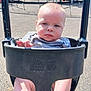 baby, child, swing, playground, outdoor, infant, seat, sunlight, netting, play_equipment, barefoot, expression, person, young_child, summer, daytime, plastic, fun, park, casual
