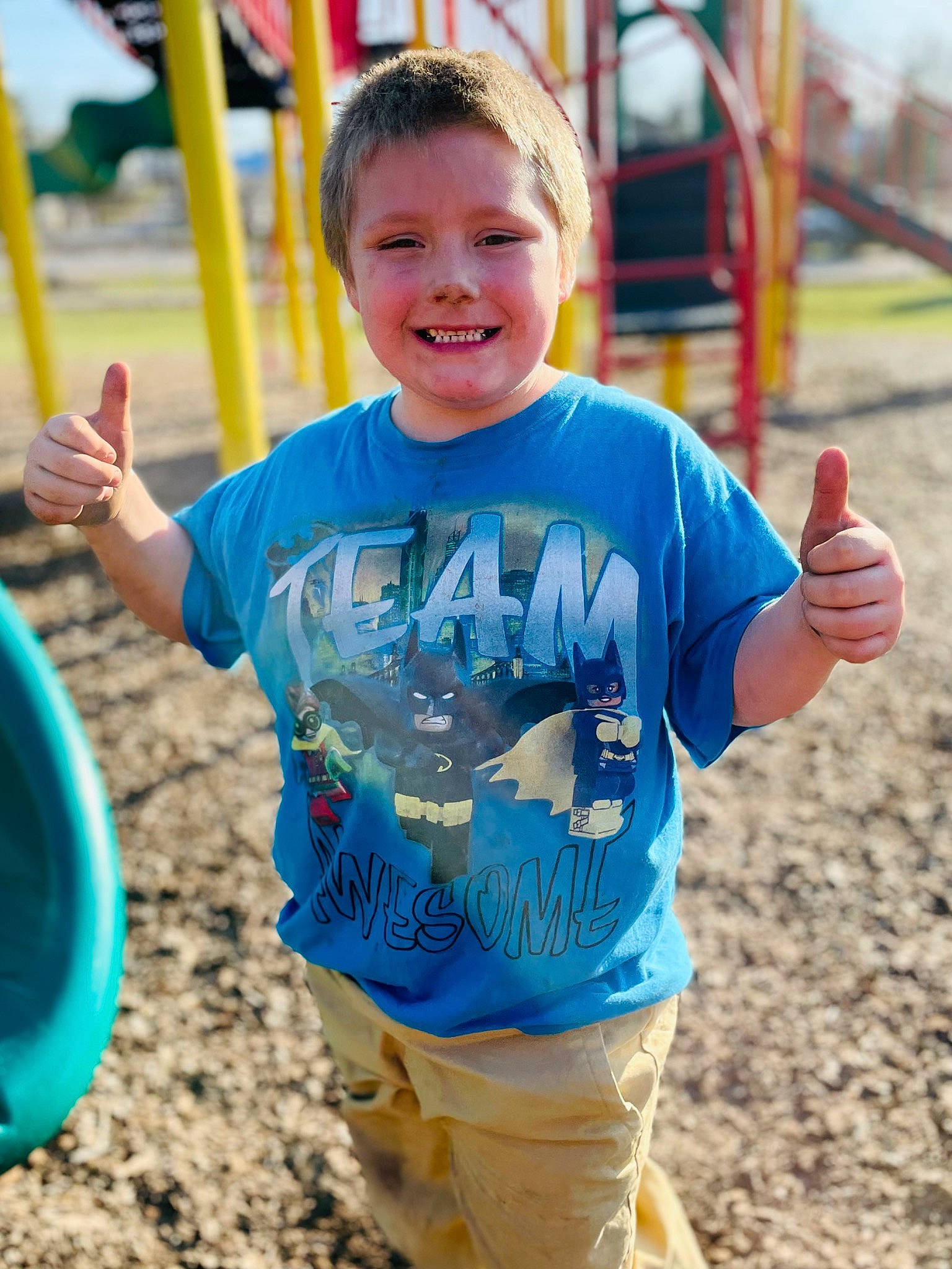Colton joined the competition — help win amazing prizes! blue, child, city, community, electric_blue, facial_expression, fun, happy, joy, leisure, outdoor_play_equipment, people, person, playground, recreation, sleeve, smile, soil, swing, t_shirt