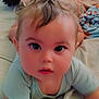 Natalie joined the competition — help win amazing prizes! baby, child, infant, face, eyes, hair, bed, blanket, fabric, clothing, cute, portrait, indoors, person, skin, expression, lying_down, toddler, soft, curious