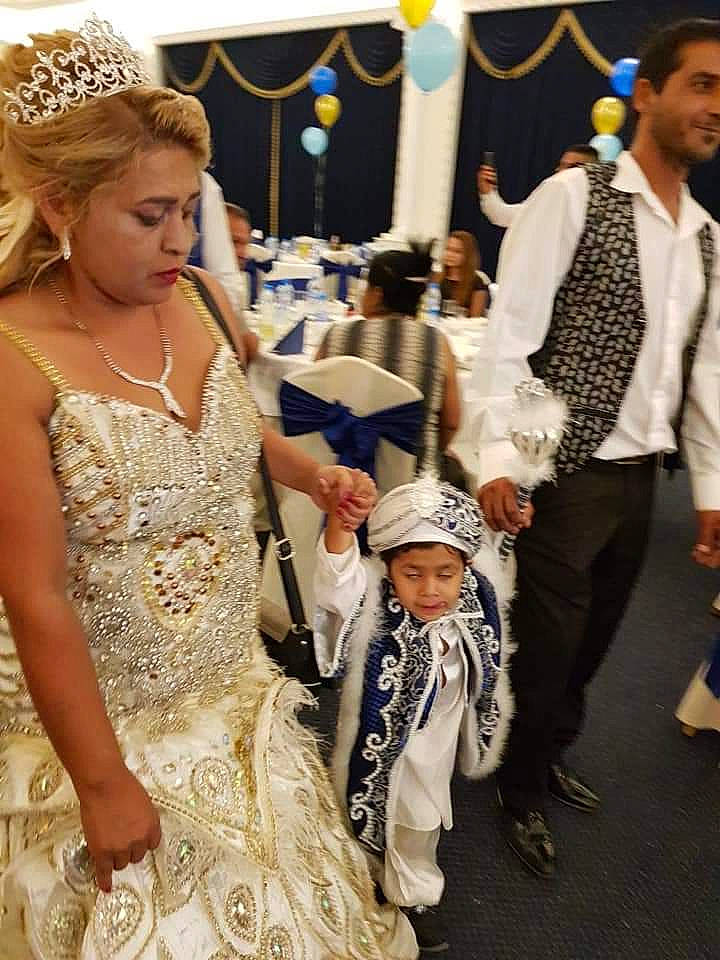 Emre participe au concours pour gagner de l'argent avec cette photo : ceremony, child, dress, event, fashion, fashion_accessory, fashion_design, formal_wear, fun, gown, headpiece, headwear, joy, person, tradition