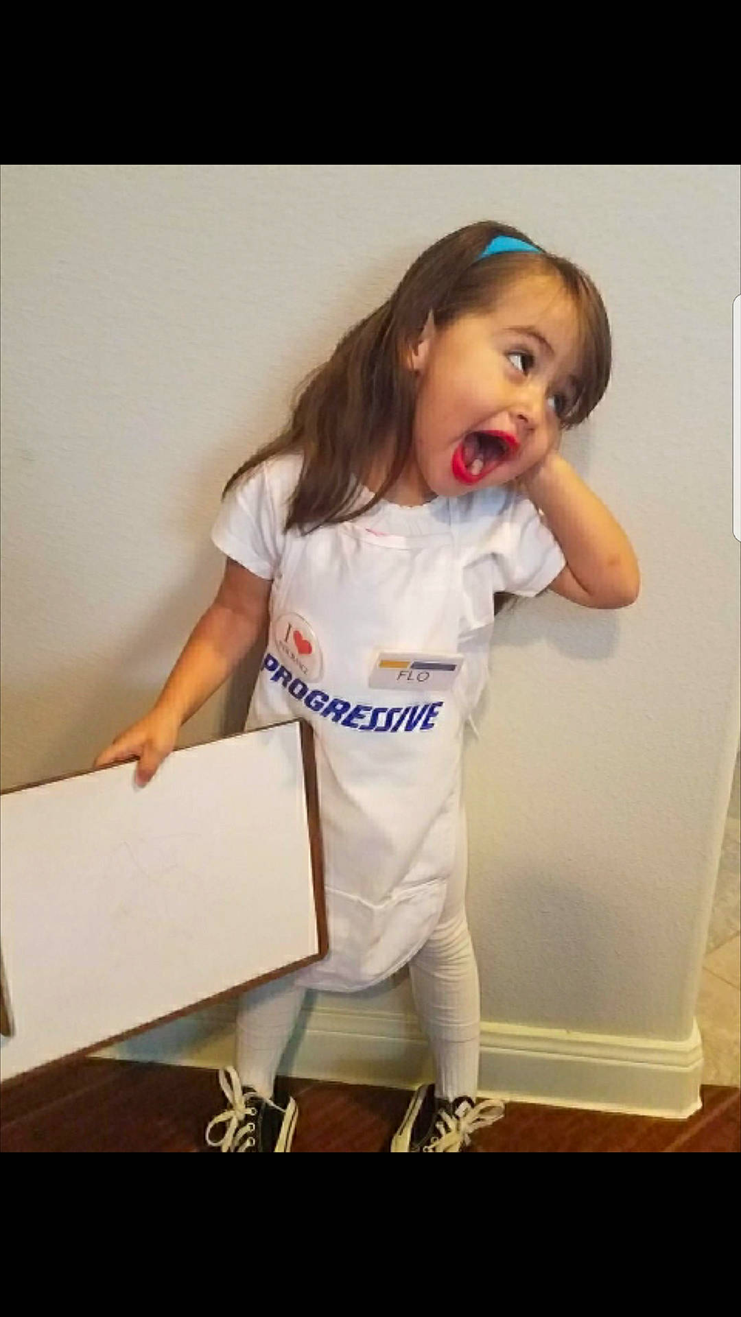 Alyanna is registered to the contest to win money with this photo: arm, child, child_model, joint, leg, person, shoulder, sleeve, smile, surprise, t_shirt, toddler, top, white