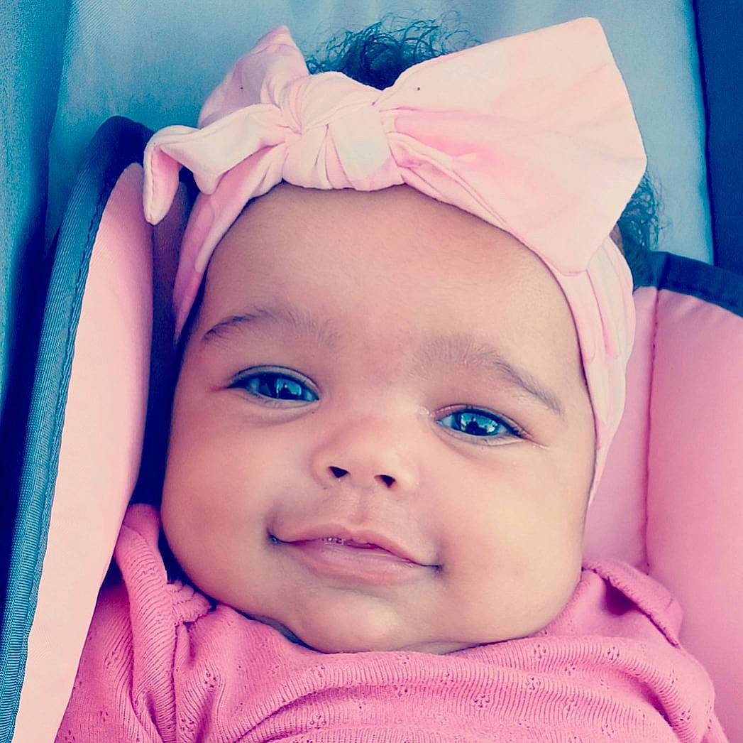 Kendall is registered to the contest to win money with this photo: azure, baby, blue, cheek, cool, eye, eyebrow, eyelash, facial_expression, happy, head, headwear, iris, lip, person, photograph, pink, product, skin, smile