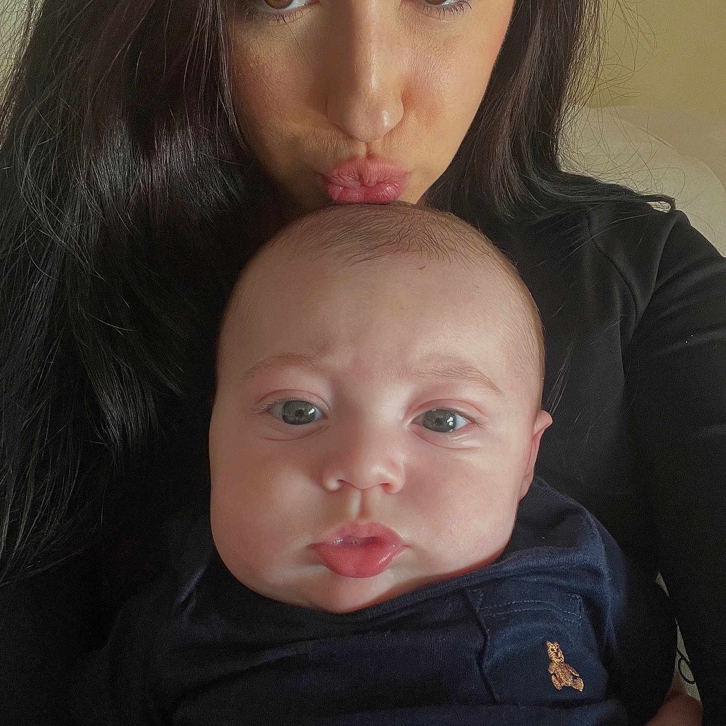Aiden is registered to the contest to win money with this photo: accessories, baby, bodypart, clothing, earring, face, frown, head, jewelry, kissing, mouth, newborn, people, person, photography, portrait, romantic, sad, selfie, t_shirt
