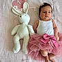 Selena participe au concours pour gagner de l'argent avec cette photo : adorable, baby, baby_clothing, baby_girl, bunny, celebration, cute, decor, flower, indoors, infant, lying_down, milestone_sign, newborn, pink_tutu, plush_toy, portrait, soft_blanket, soft_lighting, white_top