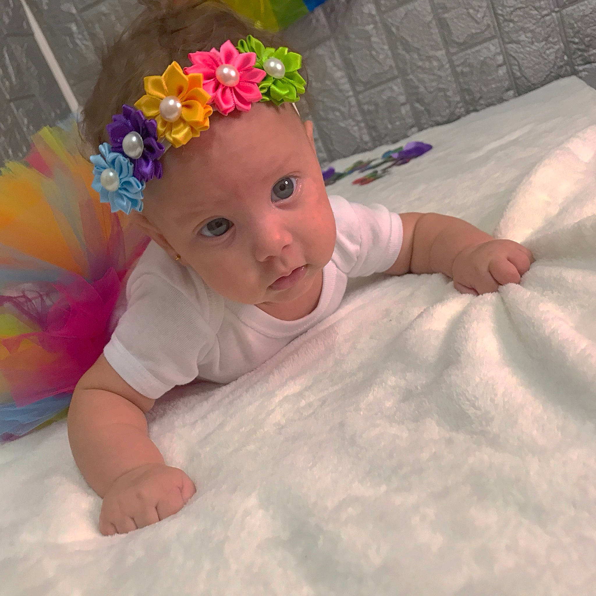 Jade participe au concours pour gagner de l'argent avec cette photo : baby, baby_products, baby_toddler_clothing, child, hair_accessory, headgear, headpiece, headwear, person, pink, product, toddler