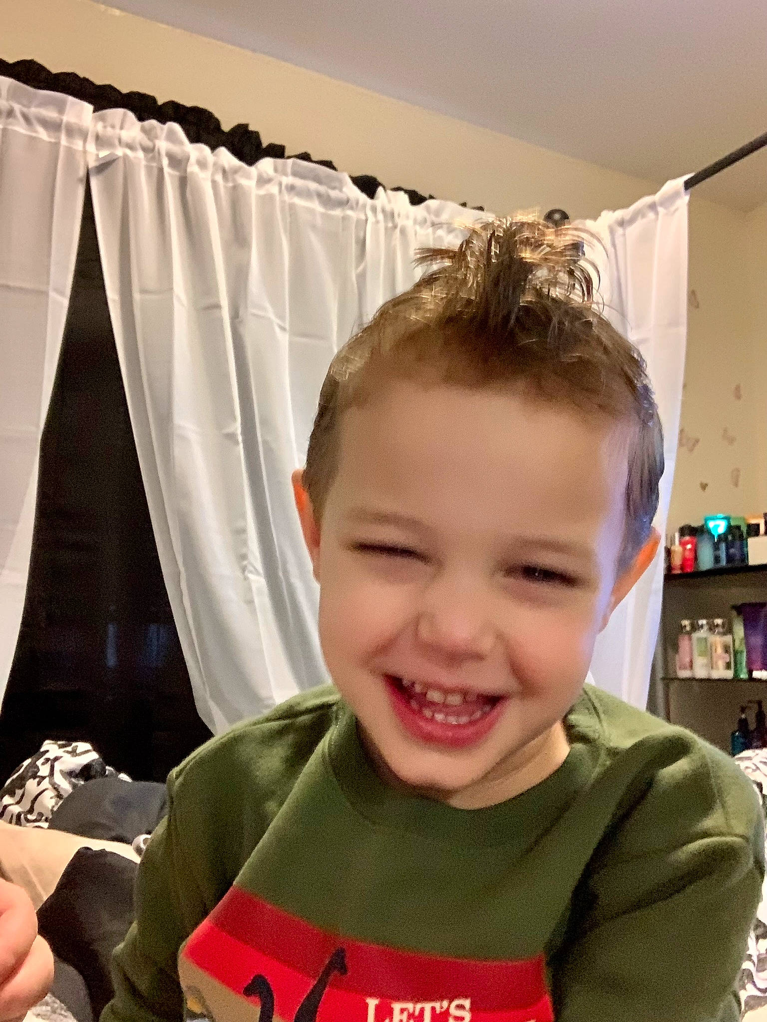 Draven is registered to the contest to win money with this photo: bookcase, cheek, chin, cool, eye, eyelash, face, fun, hairstyle, happy, head, jaw, joy, mouth, person, product, skin, sleeve, smile, standing