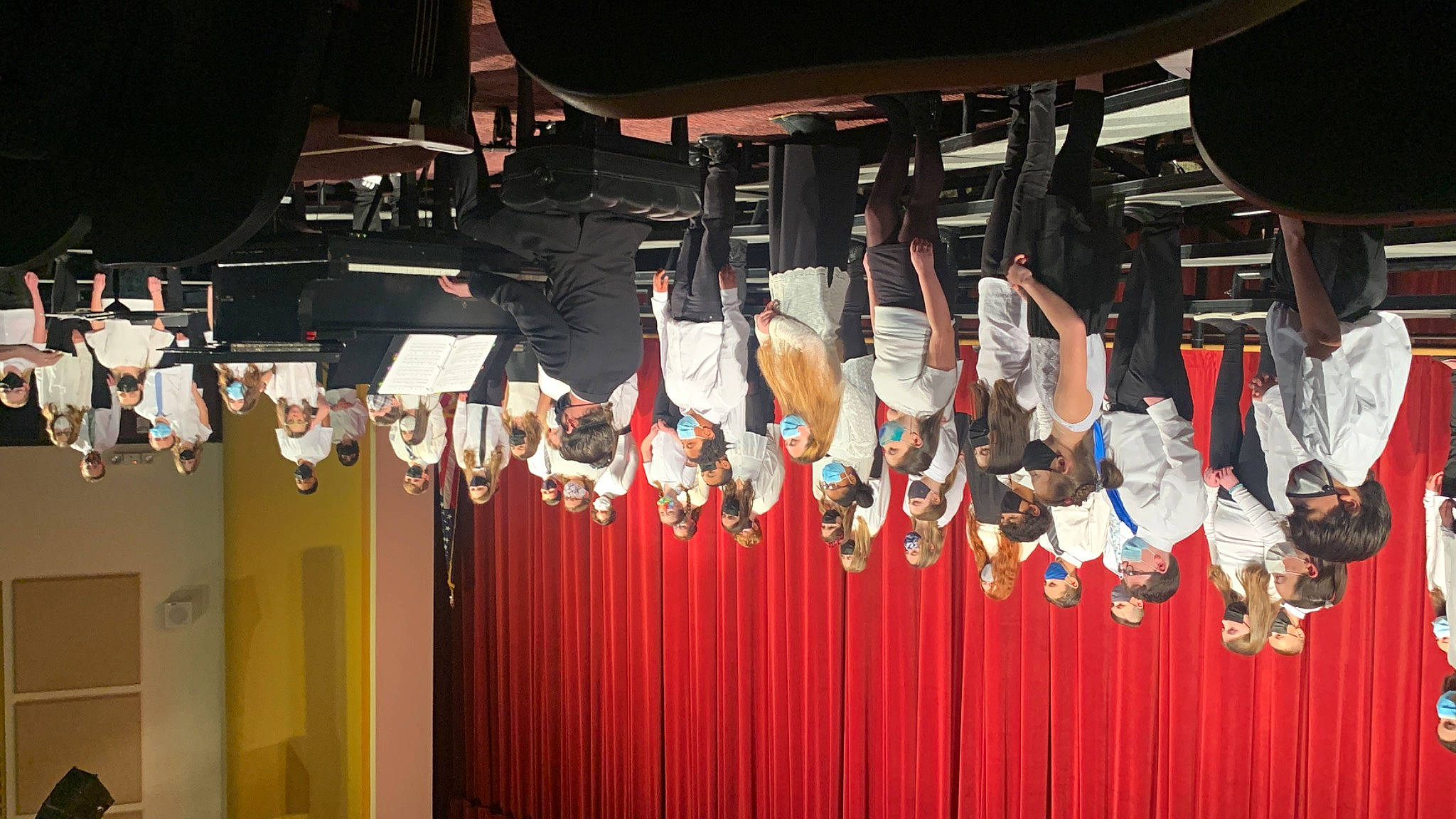 Nevaeh is registered to the contest to win money with this photo: blurred, carmine, event, idiophone, musical_instrument_accessory, person, place_of_worship, stage_equipment, temple, theater_curtain, uniform, wood