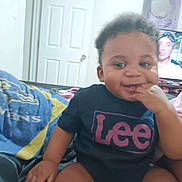 Noah joined the competition — help win amazing prizes! toddler, child, indoor, smile, clothing, lee, blanket, furniture, television, person, door, hand, face, hair, happy, sitting, diaper, room, couch, casual
