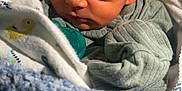 Marshall joined the competition — help win amazing prizes! baby, blanket, child, closeup, clothing, comfort, cute, face, head, indoors, infant, nap, newborn, peaceful, rest, skin, sleeping, soft, warm, wrapped