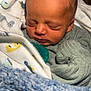 Marshall is registered to the contest to win money with this photo: baby, blanket, child, closeup, clothing, cozy, cute, face, head, indoors, infant, newborn, pacifier, peaceful, rest, skin, sleeping, soft, warm, wrapped