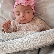 Amayah participe au concours pour gagner de l'argent avec cette photo : baby, sleeping, pink_flower, headband, blanket, cozy, infant, cute, peaceful, soft_texture, knit_sweater, closeup, indoors, portrait, child, resting, toddler, comfort, warm, sleep