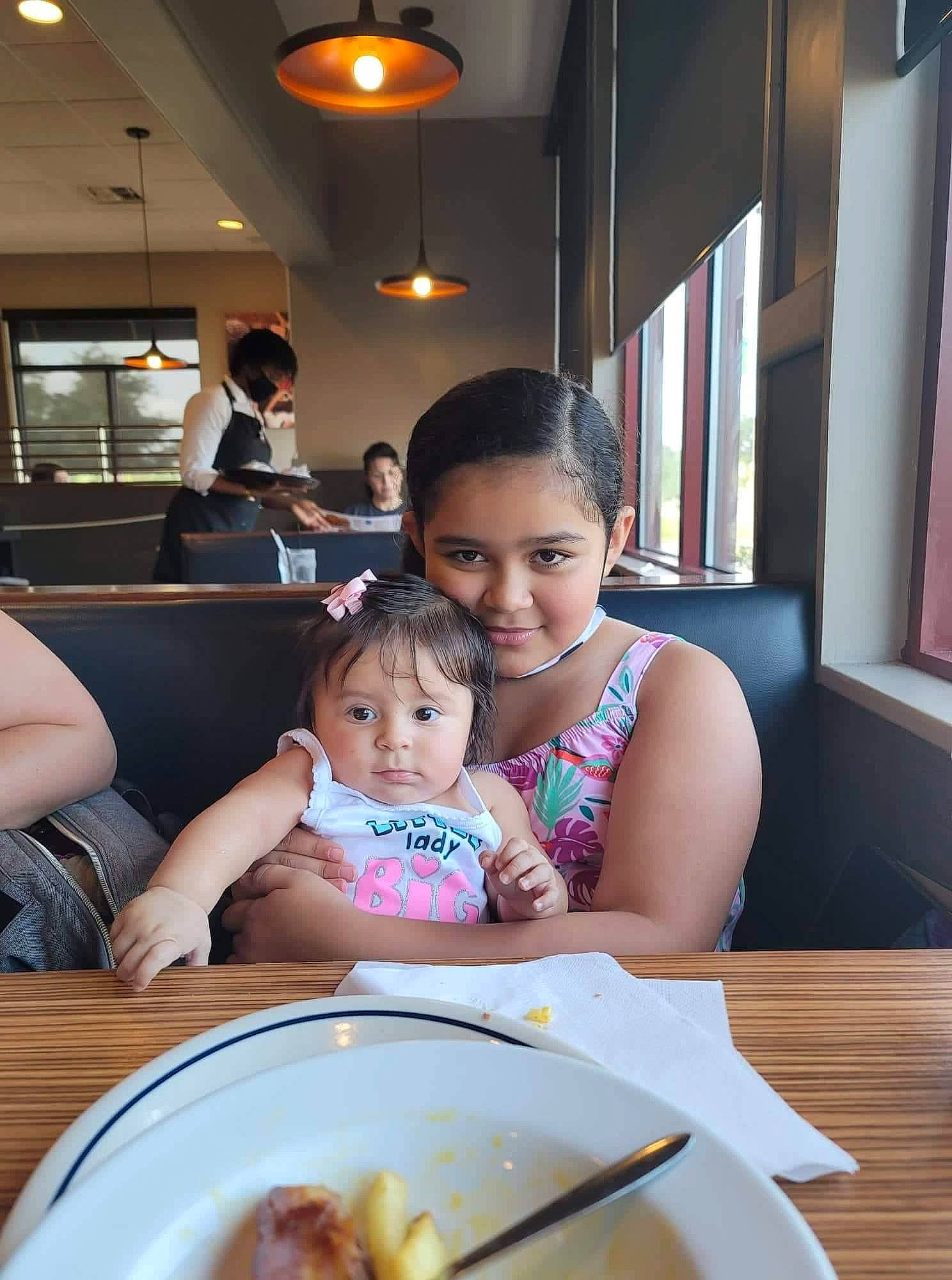 Victoria joined the competition — help win amazing prizes! baby, chair, child, comfort, cuisine, dish, dishware, event, fork, joy, kitchen_utensil, leisure, person, plate, platter, serveware, sitting, snapshot, spoon, table