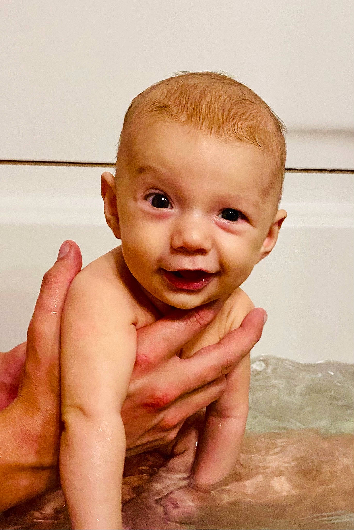 Bowen is registered to the contest to win money with this photo: arm, bathing, cheek, eyelash, flash_photography, gesture, hand, happy, human_body, jaw, joint, lip, mouth, neck, nose, person, skin, smile, stomach, thumb