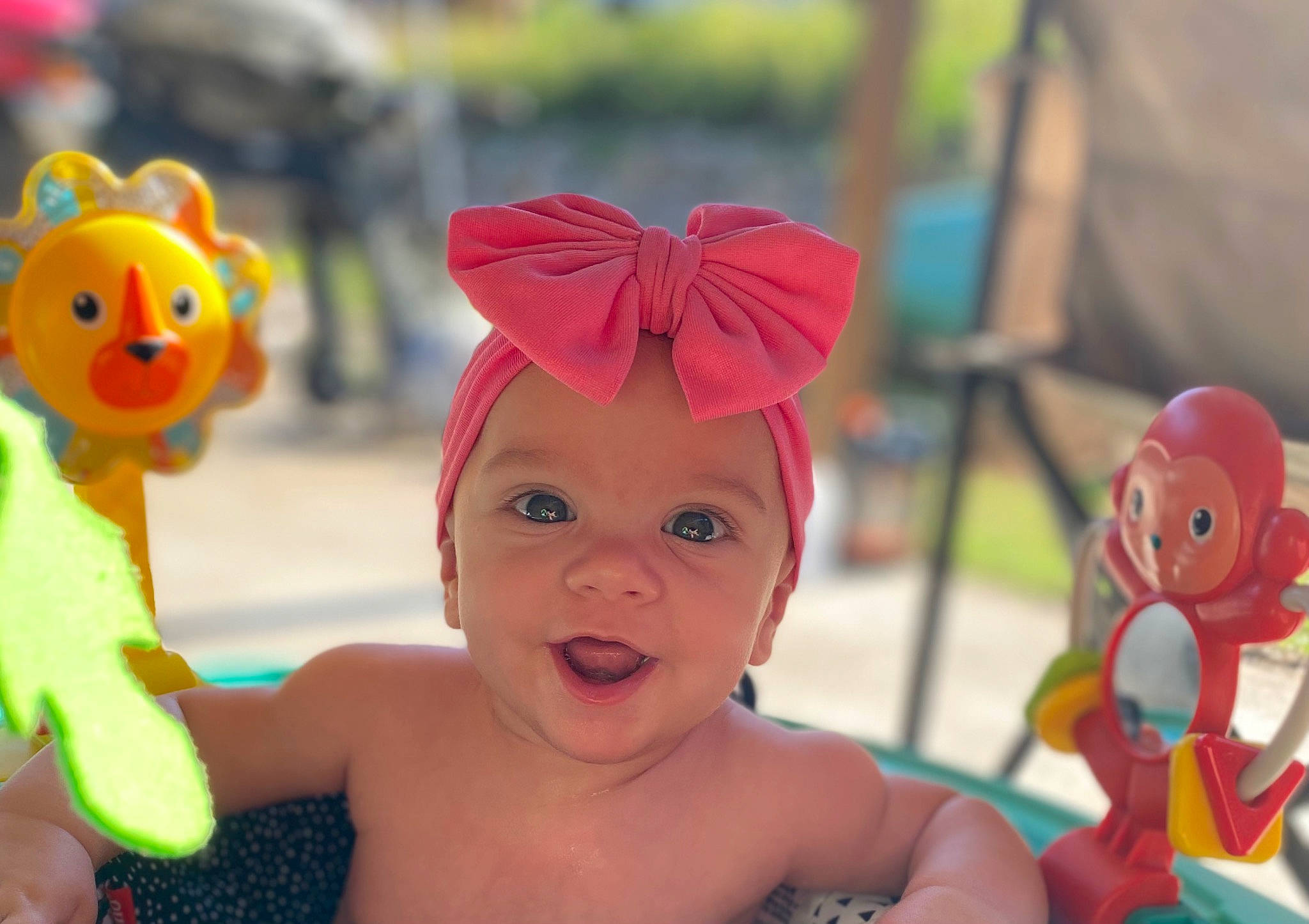 Brynlee joined the competition — help win amazing prizes! baby, cap, child, close_up, event, facial_expression, fun, happy, hat, headwear, leisure, mouth, nose, organ, person, pink, play, recreation, skin, smile