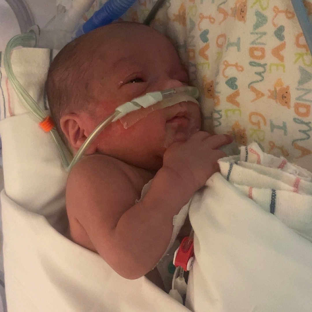 Matias is registered to the contest to win money with this photo: architecture, baby, bed, bedroom, blanket, building, cradle, crib, cushion, face, furniture, head, homedecor, hospital, infantbed, newborn, person, photography, portrait, sleeping