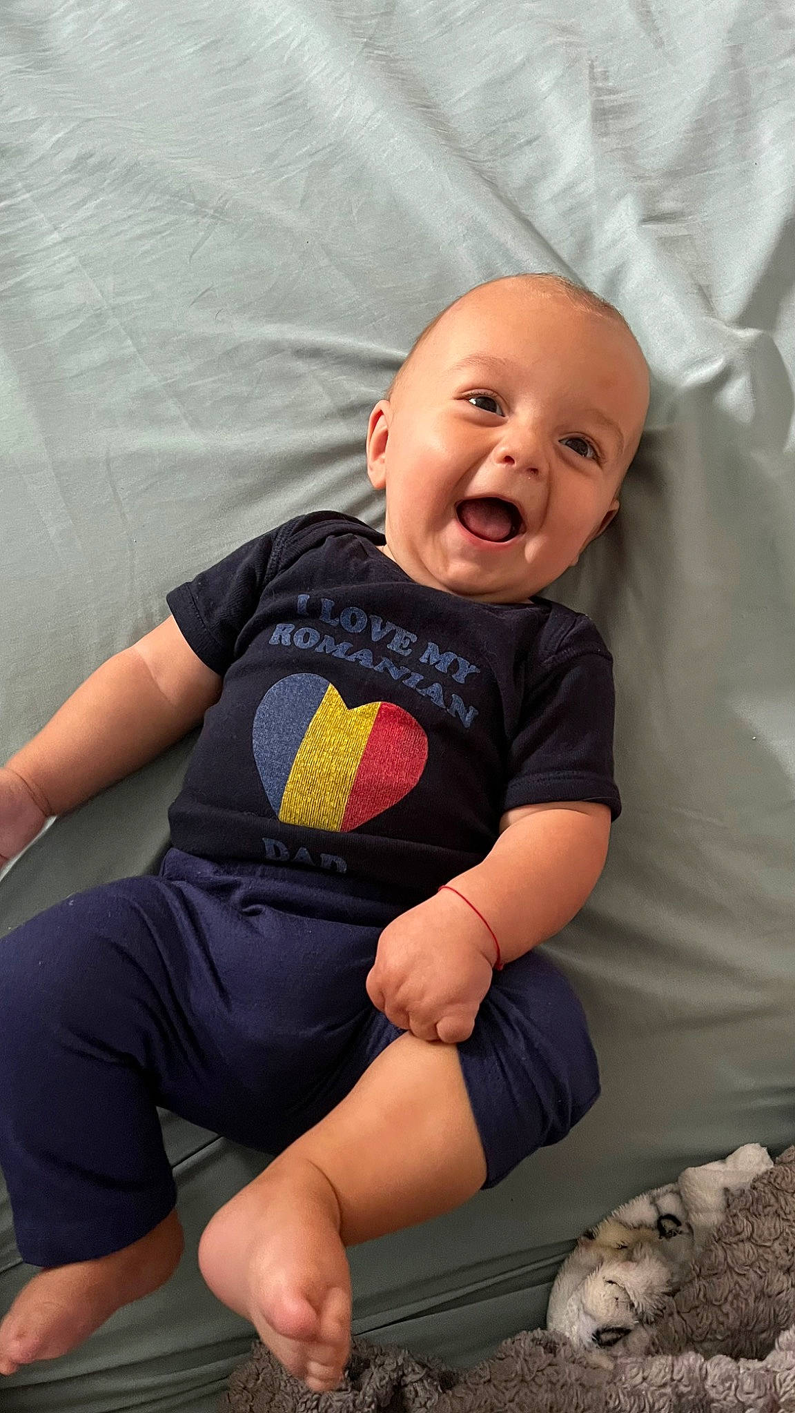 Alexandru joined the competition — help win amazing prizes! baby, baby_toddler_clothing, comfort, eye, finger, fun, hand, happy, human_body, human_leg, knee, leg, mouth, person, skin, sleeve, smile, t_shirt, textile, thigh