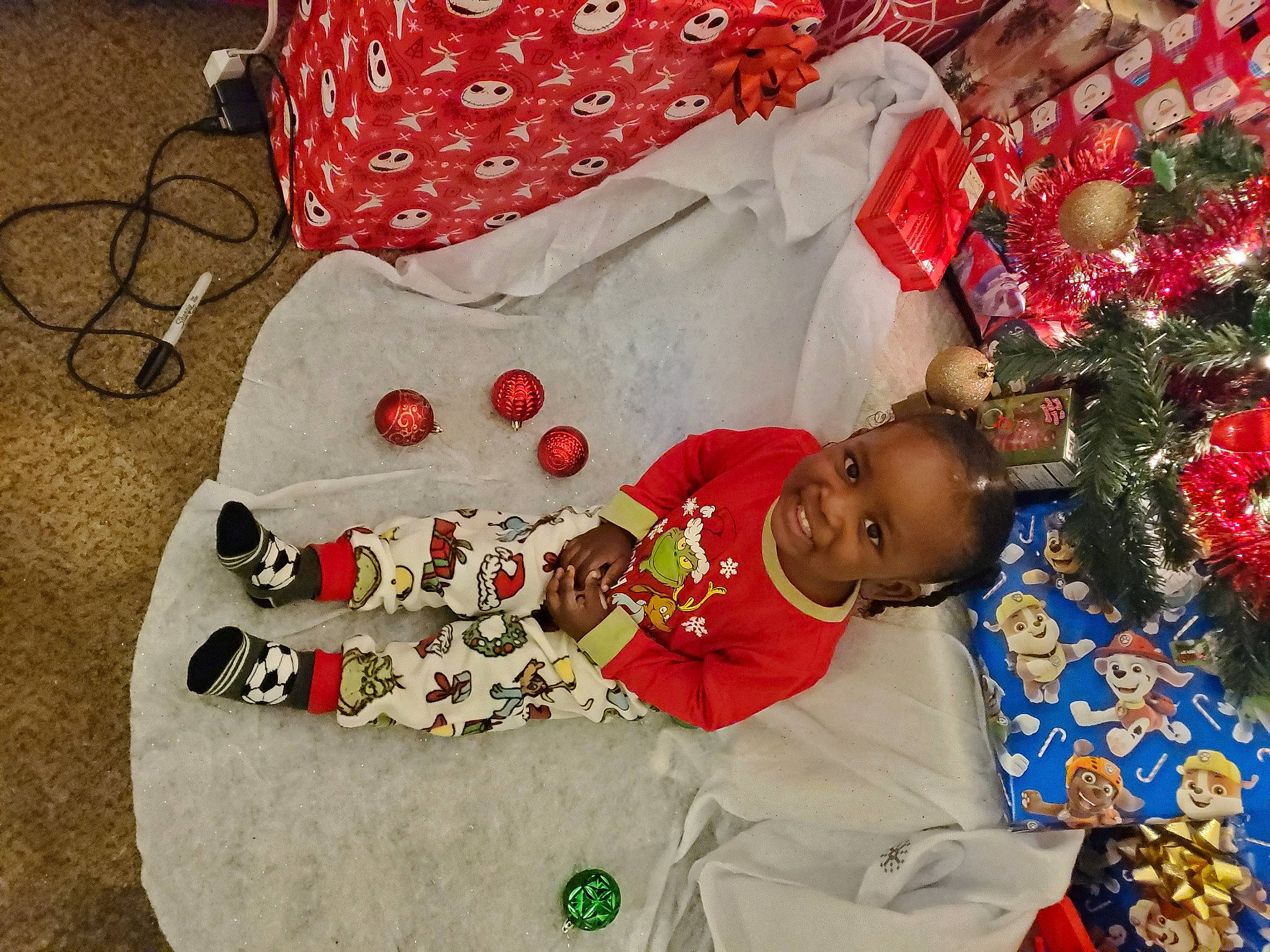 Zymir joined the competition — help win amazing prizes! baby_toddler_clothing, carmine, child, christmas, christmas_eve, christmas_tree, event, happy, holiday, joy, lap, linens, ornament, pattern, person, red, room, sleeve, smile, toddler