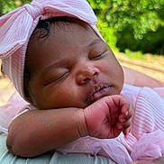 Zara joined the competition — help win amazing prizes! baby, sleeping, pink_bow, headband, infant, peaceful, closeup, portrait, outdoor, nature, soft_texture, skin, hand, cute, adorable, child, resting, toddler, calm, face