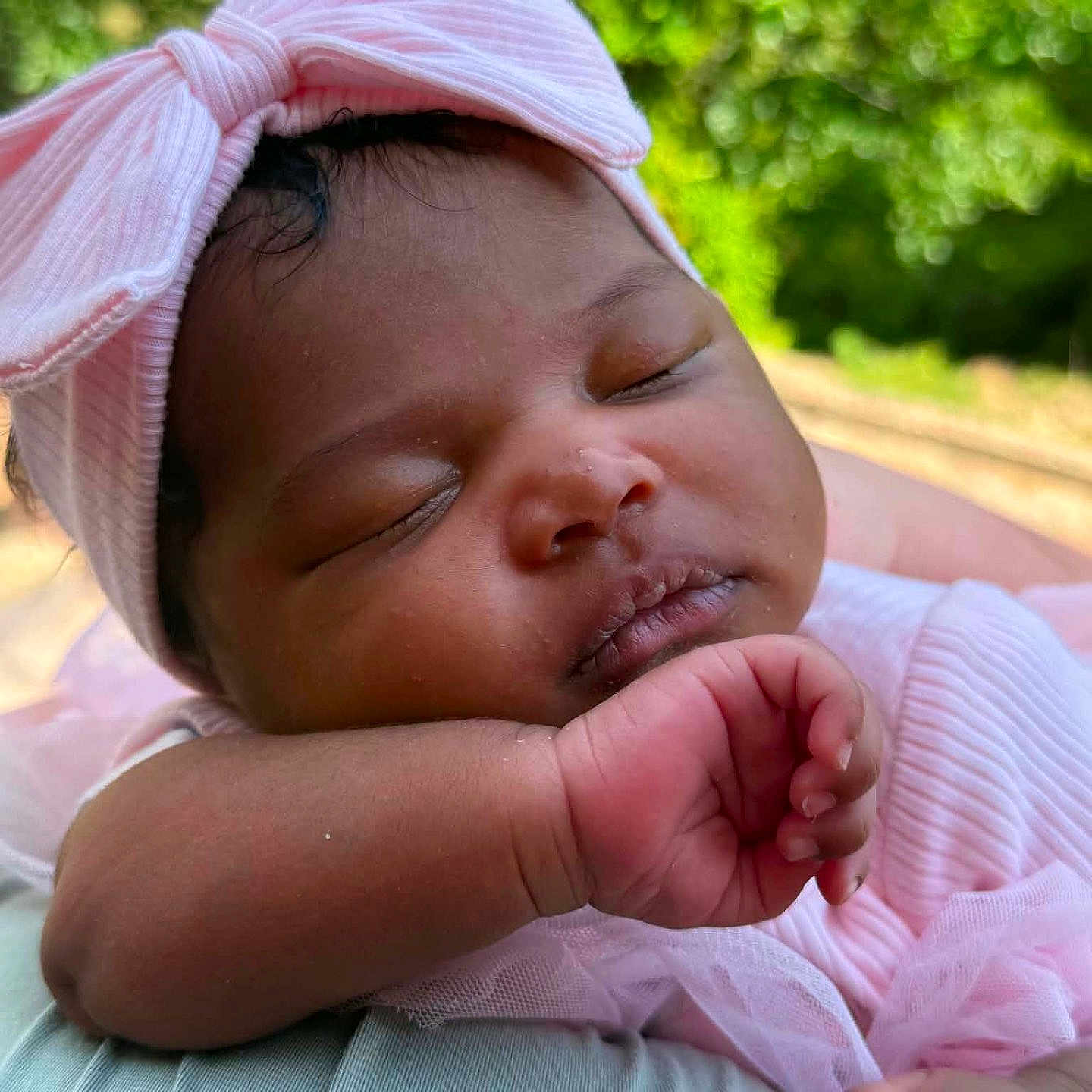 Zara joined the competition — help win amazing prizes! baby, sleeping, pink_bow, headband, infant, peaceful, closeup, portrait, outdoor, nature, soft_texture, skin, hand, cute, adorable, child, resting, toddler, calm, face