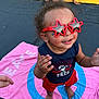 toddler, child, sunglasses, star_shaped, barefoot, towel, pink, blue, red_shorts, tank_top, outdoor, asphalt, yellow_curb, happy, smiling, person, playing, summer, casual_clothing, two_children