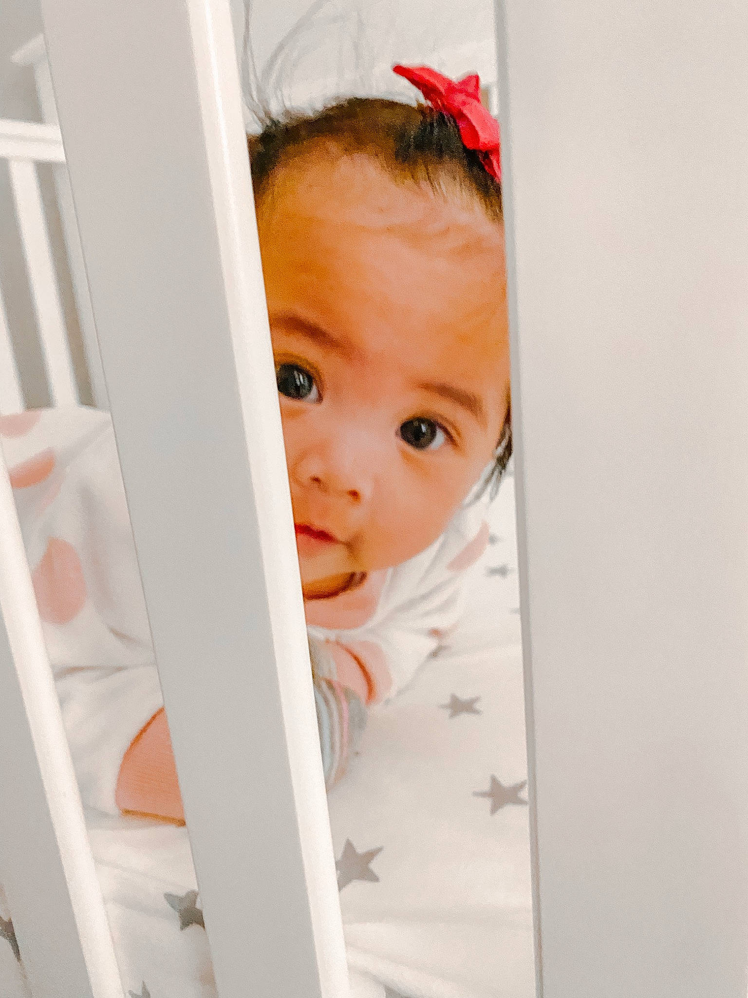 Alexandria is registered to the contest to win money with this photo: baby, baby_toddler_clothing, child, eye, eyebrow, eyelash, fashion_accessory, flooring, hair_accessory, happy, headband, headpiece, iris, lip, person, portrait_photography, room, sleeve, toddler, window