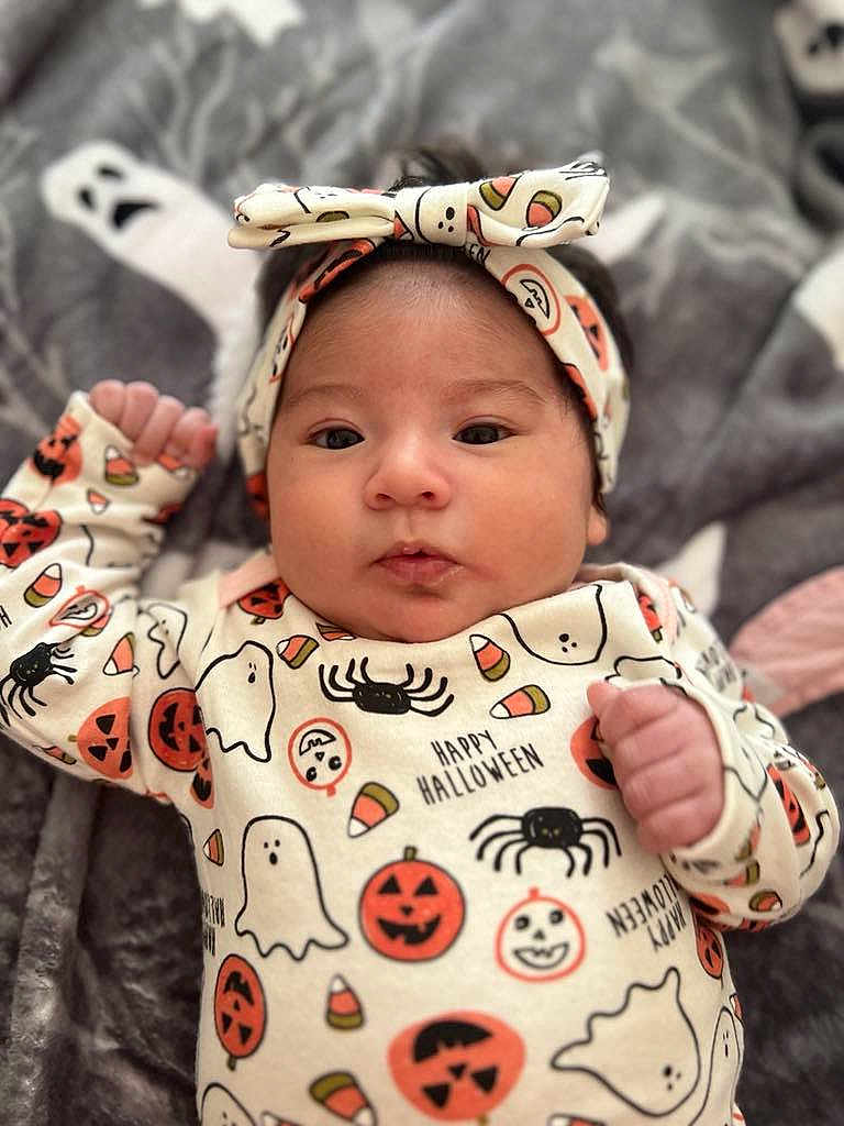 Zurynna is registered to the contest to win money with this photo: baby, blanket, bodypart, bonnet, clothing, face, finger, hand, happy, hat, head, hood, newborn, pajamas, person, photography, portrait, sleeve, smile, yawning