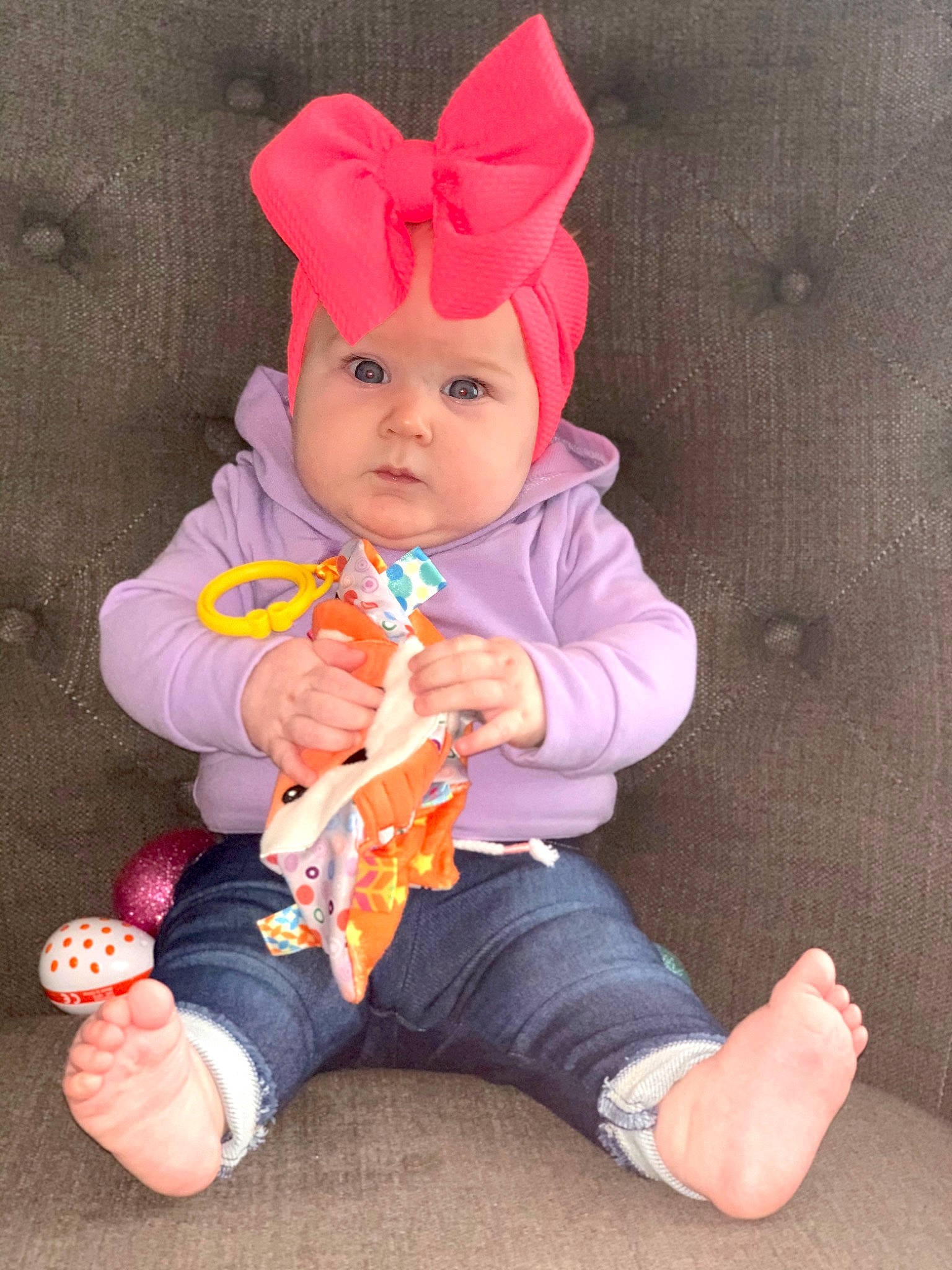 Baker joined the competition — help win amazing prizes! baby, child, headwear, orange, person, pink, play, sitting, toddler