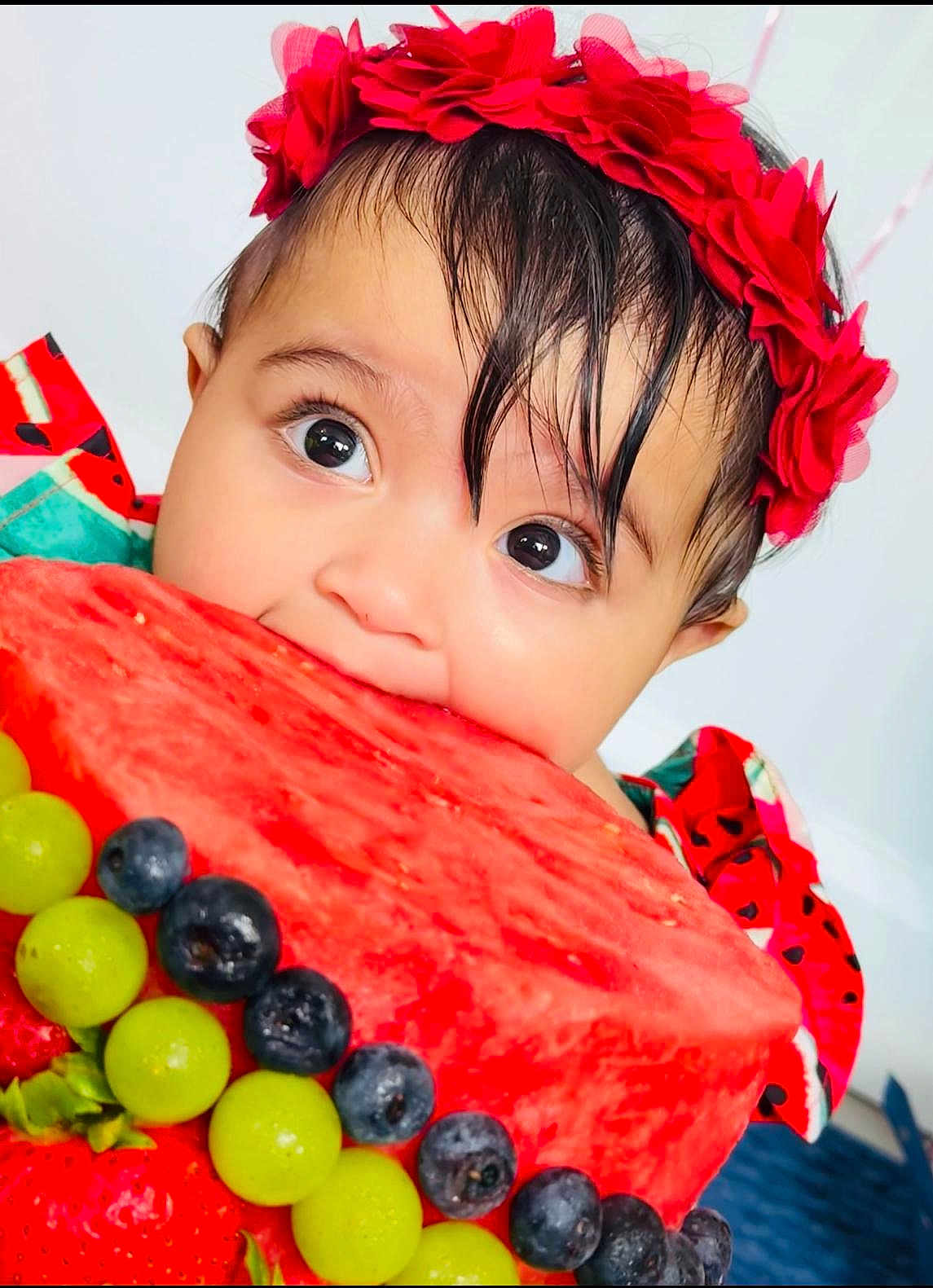 Taqdeer joined the competition — help win amazing prizes! baby, child, watermelon, fruit, grapes, blueberries, strawberries, headband, red_flower, cute, closeup, food, snack, healthy_eating, summer, portrait, bright_colors, happy, eyes, skin