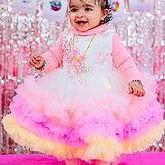 Taqdeer joined the competition — help win amazing prizes! toddler, child, smiling, dress, pink, yellow, white, bow, pearls, party, celebration, festive, background, sparkles, happy, standing, cute, accessories, indoors, portrait