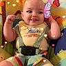 Renesmee joined the competition — help win amazing prizes! baby, child, infant, smile, happy, butterfly_filter, heart_effects, baby_seat, colorful, playful, cute, face, eyes, hands, clothing, seatbelt, indoors, tongue_out, toddler, digital_filter
