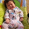 Calliope joined the competition — help win amazing prizes! baby, infant, child, smiling, curly_hair, portrait, bouncer, baby_seat, indoors, carpet, colorful, cartoon, animal_print, onesie, pink_clothing, sitting, happy, relaxed, face, photography