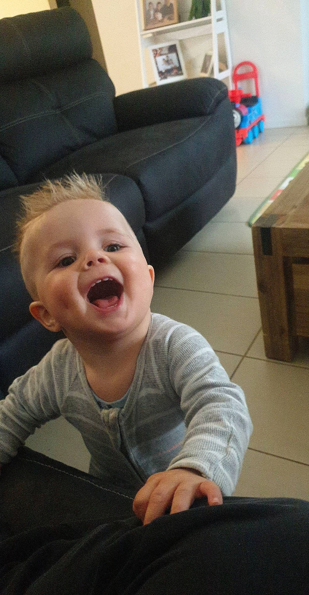 Bentley joined the competition — help win amazing prizes! arm, baby, cheek, child, comfort, face, flooring, fun, gesture, hair, happy, head, mouth, nose, person, smile, snapshot, standing, toddler, tooth