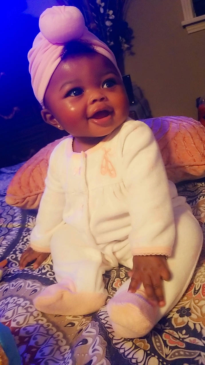 A'Maria is registered to the contest to win money with this photo: baby, cheek, child, child_model, forehead, fun, happy, head, headgear, human, nose, person, sitting, skin, smile, toddler