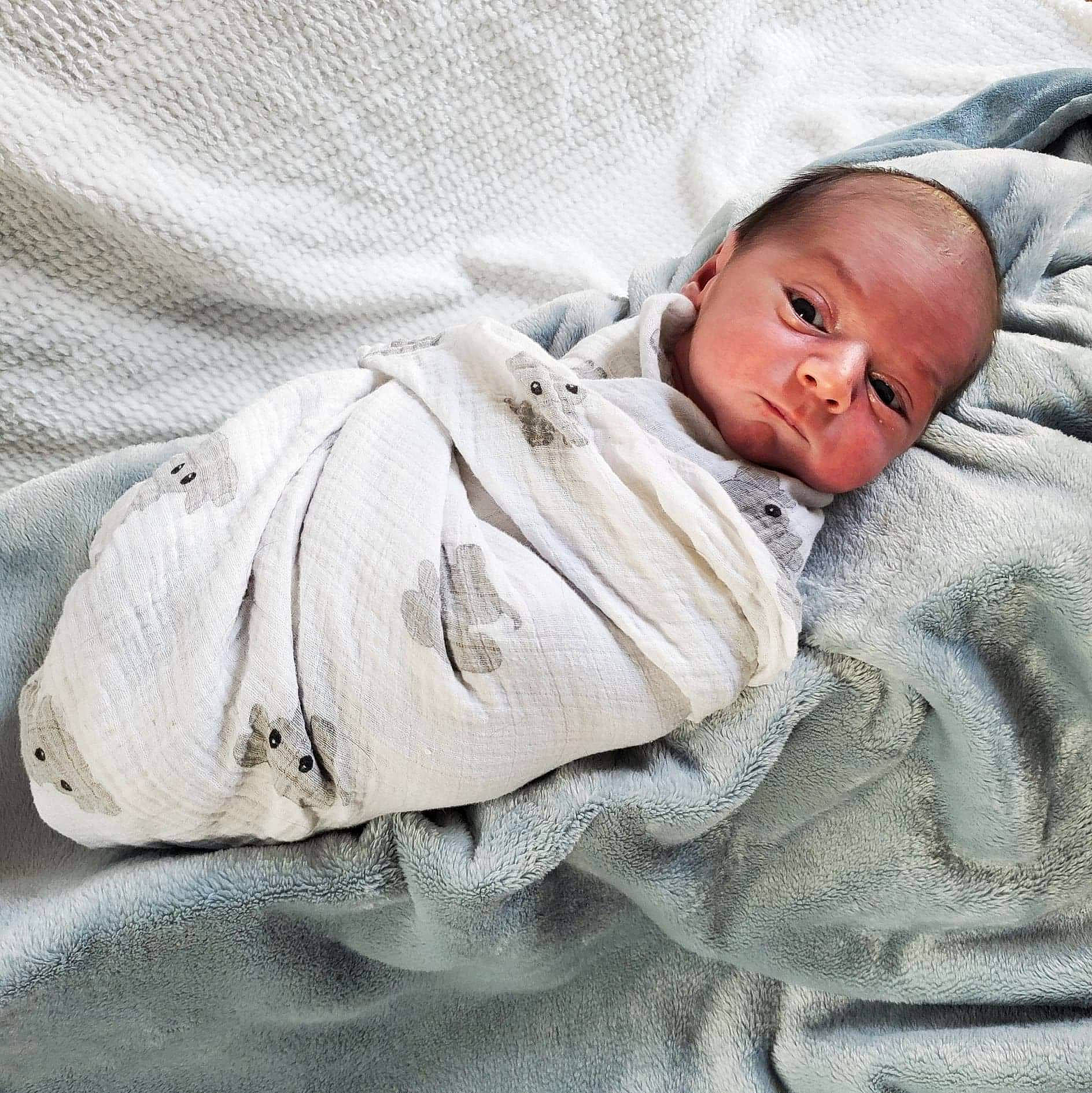 Jameson is registered to the contest to win money with this photo: baby, baby_products, baby_sleeping, baby_toddler_clothing, bedding, bedtime, blanket, child, comfort, fur, hat, linens, nap, person, room, sleep, sleeve, textile, toddler