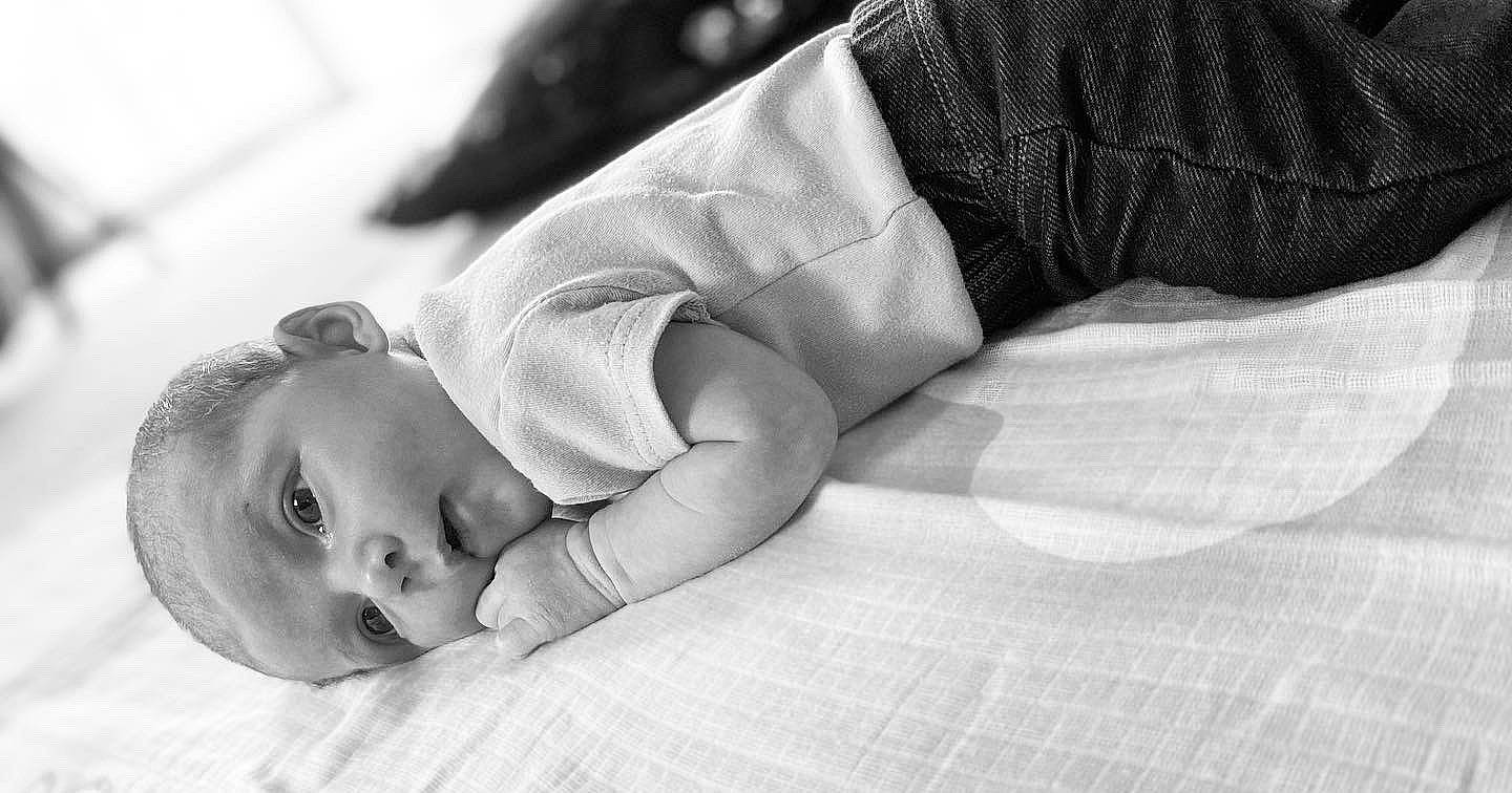 Kora is registered to the contest to win money with this photo: arm, baby, black, black_and_white, child, comfort, floor, flooring, hand, leg, monochrome, monochrome_photography, person, photograph, photography, style, toddler, white
