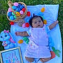 Evangeline is registered to the contest to win money with this photo: baby, basket, blanket, bunny, celebration, child, cute, decoration, easter_eggs, frame, grass, holiday, holiday_theme, infant, outdoor, pink_dress, portrait, sock, spring, toy