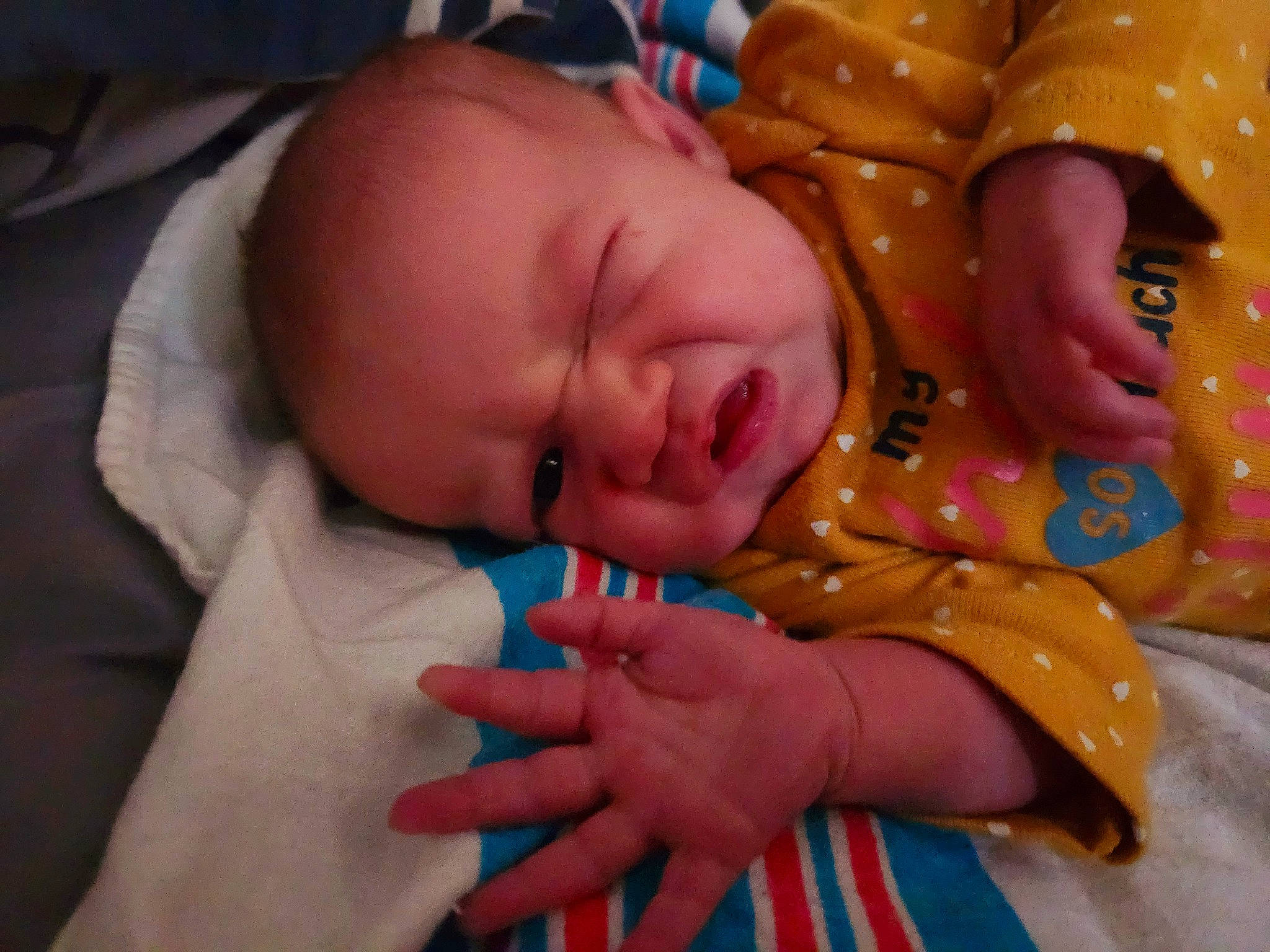 Marley joined the competition — help win amazing prizes! baby, baby_products, baby_toddler_clothing, bedtime, cheek, child, comfort, finger, gesture, hand, human_body, linens, mouth, nail, nose, pattern, person, room, skin, thumb