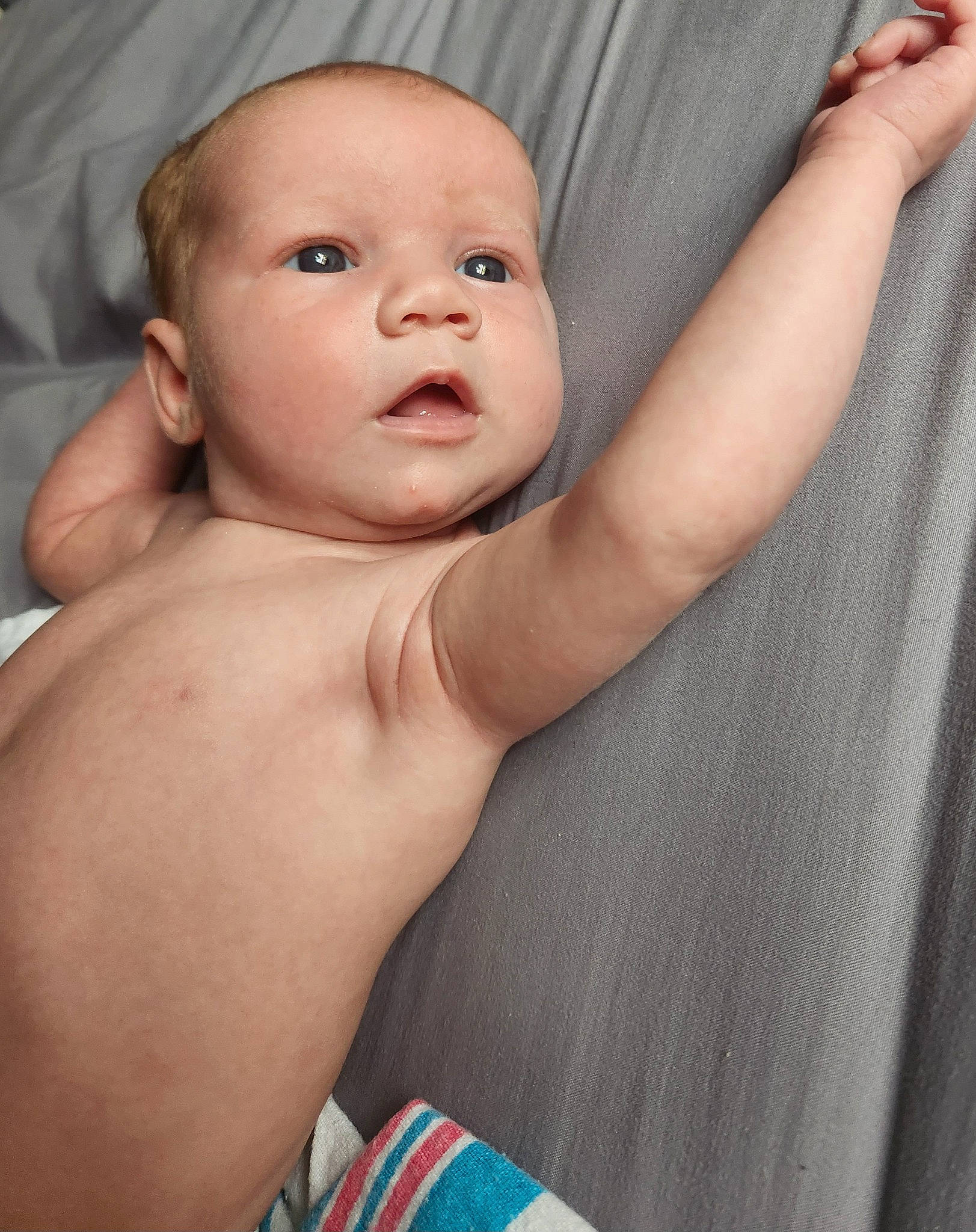 Marley is registered to the contest to win money with this photo: arm, baby, cheek, chest, comfort, eye, eyebrow, eyelash, flash_photography, gesture, happy, human_body, iris, joint, lip, mouth, nose, person, skin, stomach