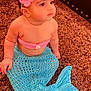 Rubab is registered to the contest to win money with this photo: accessories, baby, bodypart, clothing, costume, couch, cushion, dress, face, finger, glove, hand, hat, head, headband, homedecor, pants, person, photography, portrait