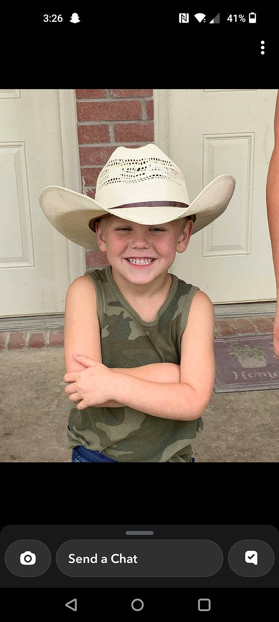Royce joined the competition — help win amazing prizes! blond, cap, child, costume_hat, cowboy_hat, door, face, fashion_accessory, flash_photography, fun, gesture, happy, hat, headwear, joy, person, personal_protective_equipment, sleeve, smile, standing