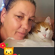 George joined the competition — help win amazing prizes! woman, cat, face, pet, orange_cat, white_cat, close_up, selfie, headband, earring, indoor, portrait, animal, cute, relaxing, feline, human, companion, cozy, affection