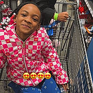 Majesty is registered to the contest to win money with this photo: child, children, shopping_cart, snacks, store_aisle, smiling, jacket, puffer_coat, blue_pants, braided_hair, grocery_store, retail, fun, happy, indoor, people, retail_shelves, food, casual_clothing, playful