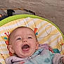 baby, infant, smiling, laughing, child, cushion, colorful, pattern, clothing, pastel_colors, happy, face, mouth_open, indoor, person, cute, joy, seated, soft_texture, background