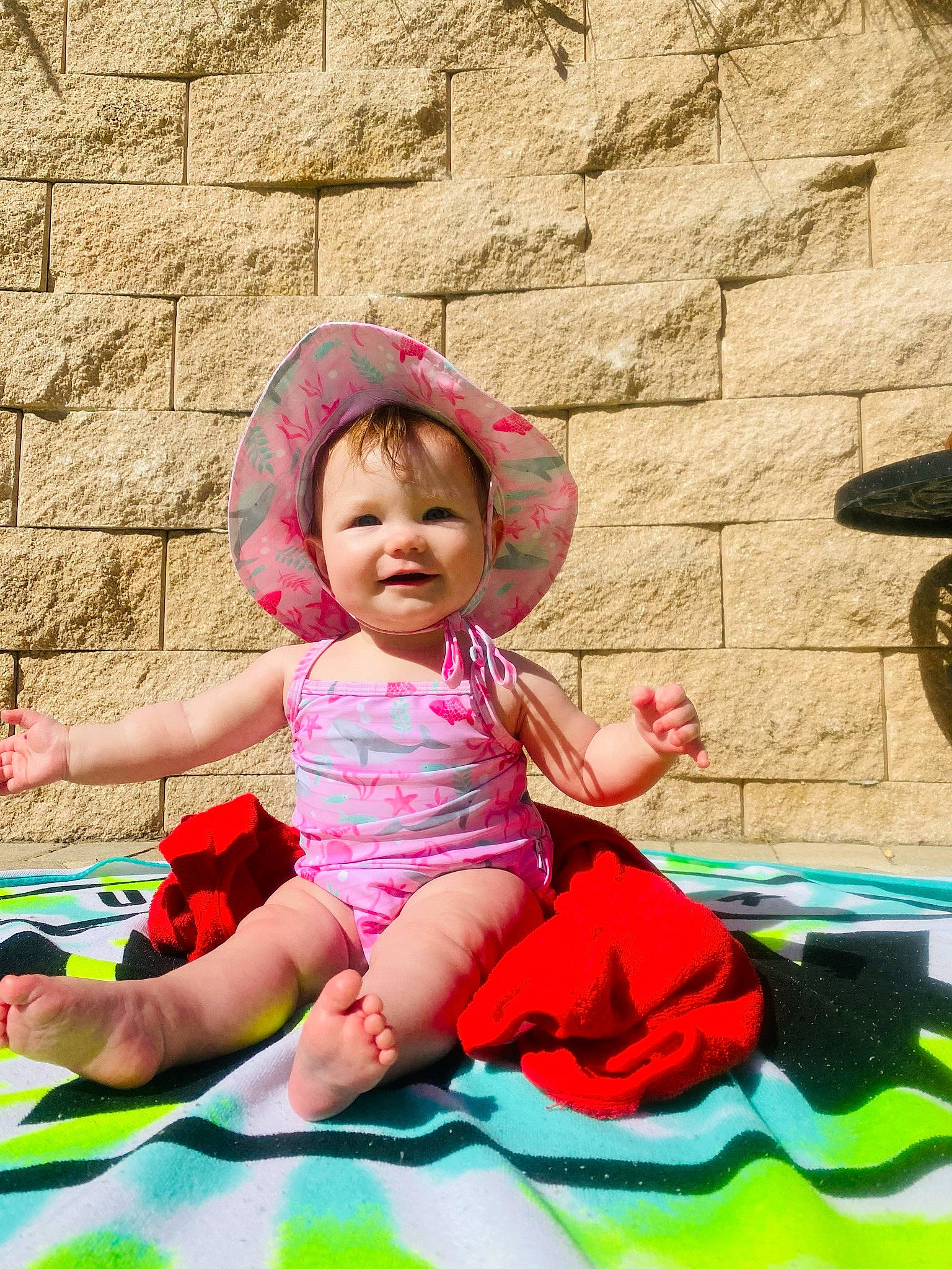 Giavanna joined the competition — help win amazing prizes! baby, baby_carriage, baby_toddler_clothing, child, fun, grass, green, happy, joy, leisure, magenta, person, pink, play, recreation, sandal, shorts, sitting, spring, t_shirt